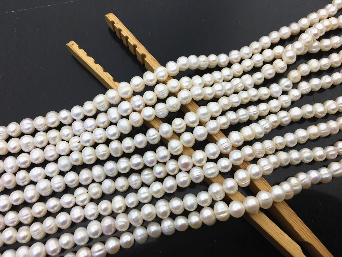 AA 5.7-6.5mm white Ring potato freshwater pearl,near round white pearl bead strand supply from China, wholesale in bulk,CR6-2A-2