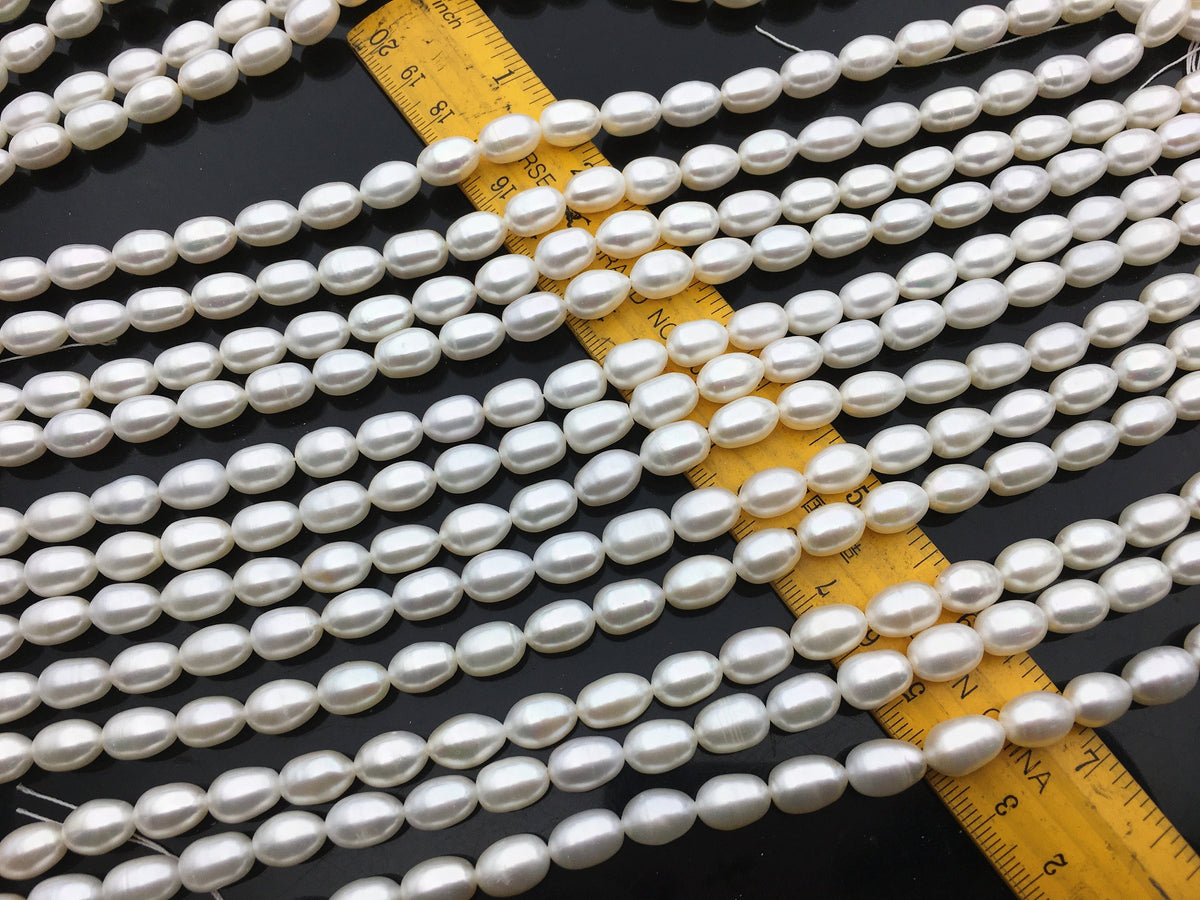 AAA 7.4-8.2x10-11mm white long rice freshwater pearls,LR8-3A-86