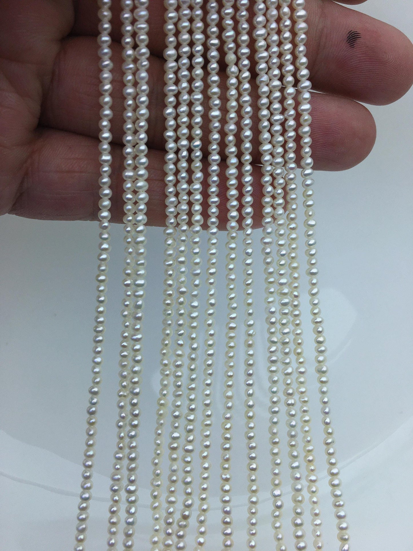 AAA 2.4-2.6mm tiny white near round seed freshwater pearl,genuine pearl strands at wholesale prices,RP2-3A-7