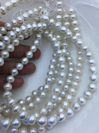 AA+ 9-11mm white button round Edison Freshwater Pearl,ED12-2A-5-58