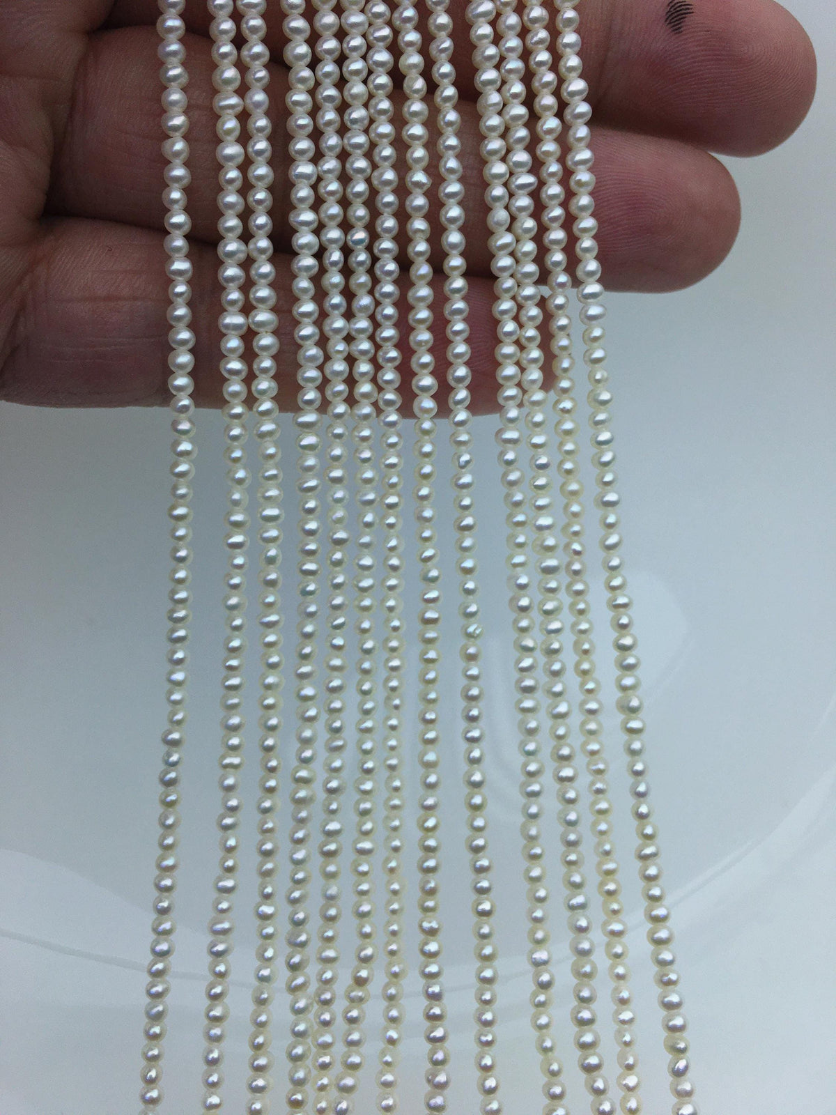 AAA 2.4-2.6mm tiny white near round seed freshwater pearl,genuine pearl strands at wholesale prices,RP2-3A-7