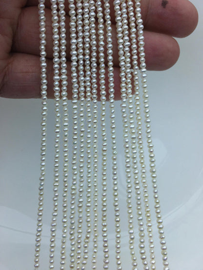 AAA 2.4-2.6mm tiny white near round seed freshwater pearl,genuine pearl strands at wholesale prices,RP2-3A-7