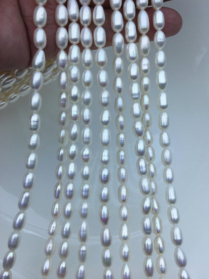 AAA 5.5-6x7-9mm white long rice freshwater pearls,Freshwater Pearl Rice Beads,LR5-3A-53