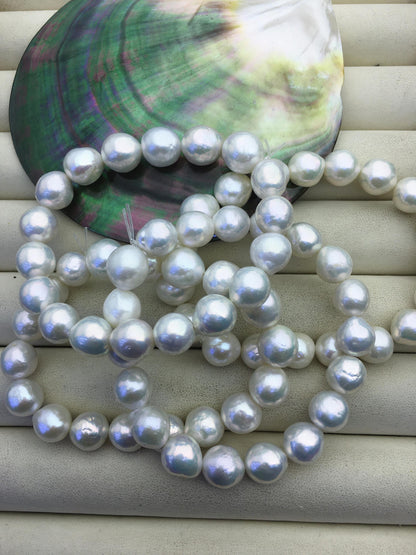 7'' AA+ 9-11mm white baroque near round Freshwater pearl Elastic string Bracelet,B8-T7