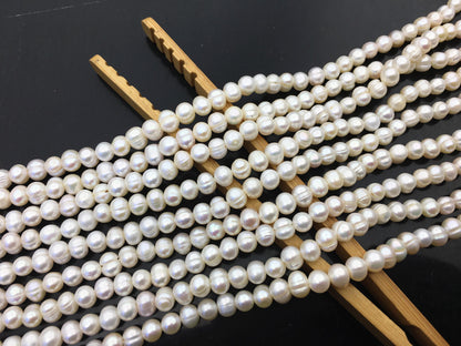 AA 5.7-6.5mm white Ring potato freshwater pearl,near round white pearl bead strand supply from China, wholesale in bulk,CR6-2A-2