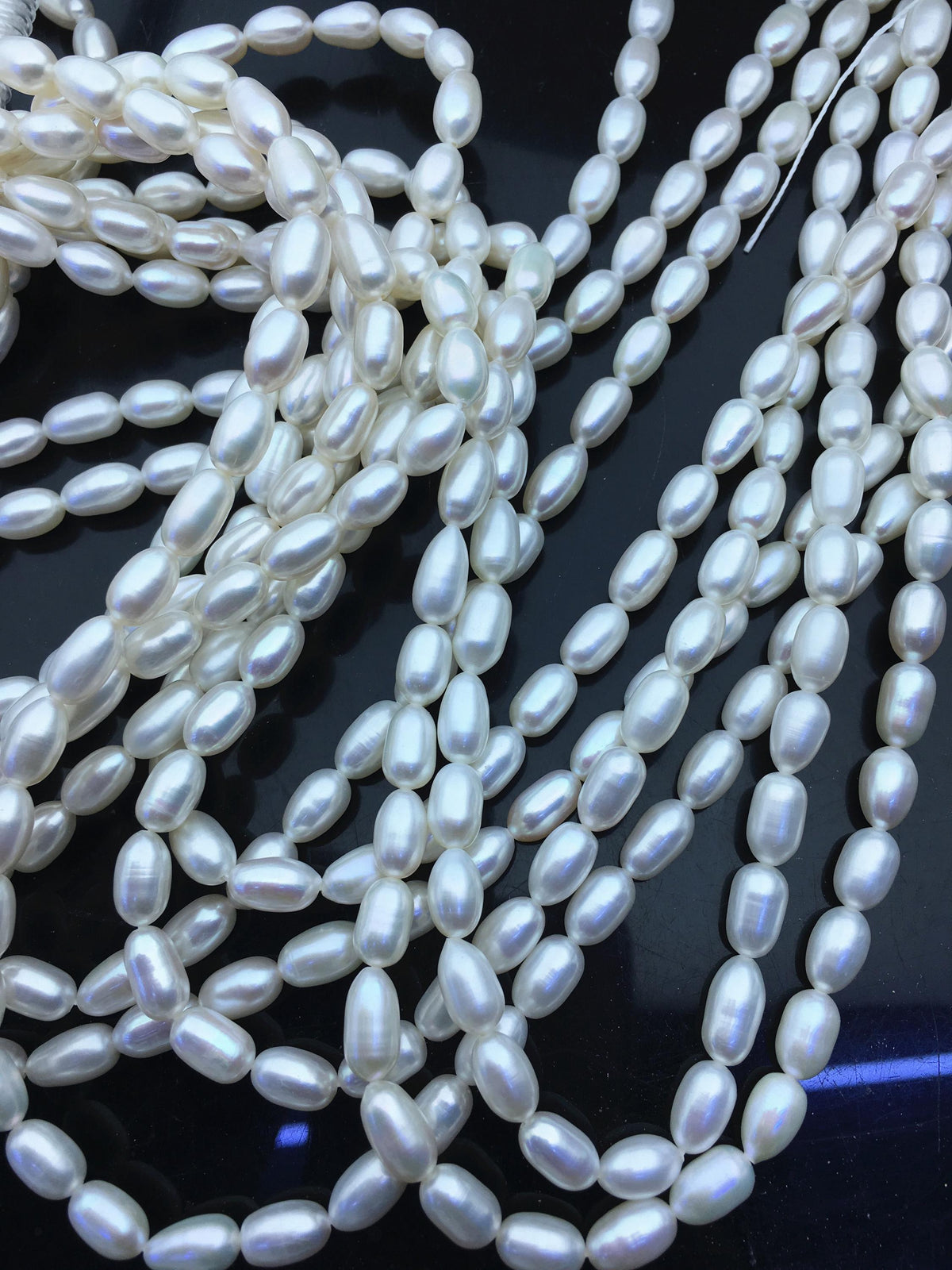 AAA 5.5-6x7-9mm white long rice freshwater pearls,Freshwater Pearl Rice Beads,LR5-3A-53