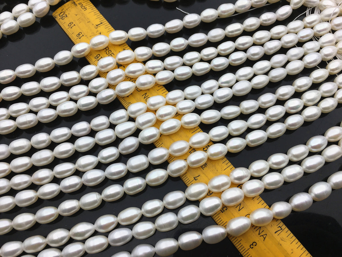 AAA 7.4-8.2x10-11mm white long rice freshwater pearls,LR8-3A-86