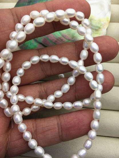 2pc 7 inchs AAA 4.5-5mm small white rice Freshwater pearl Elastic string Bracelet,B8-038