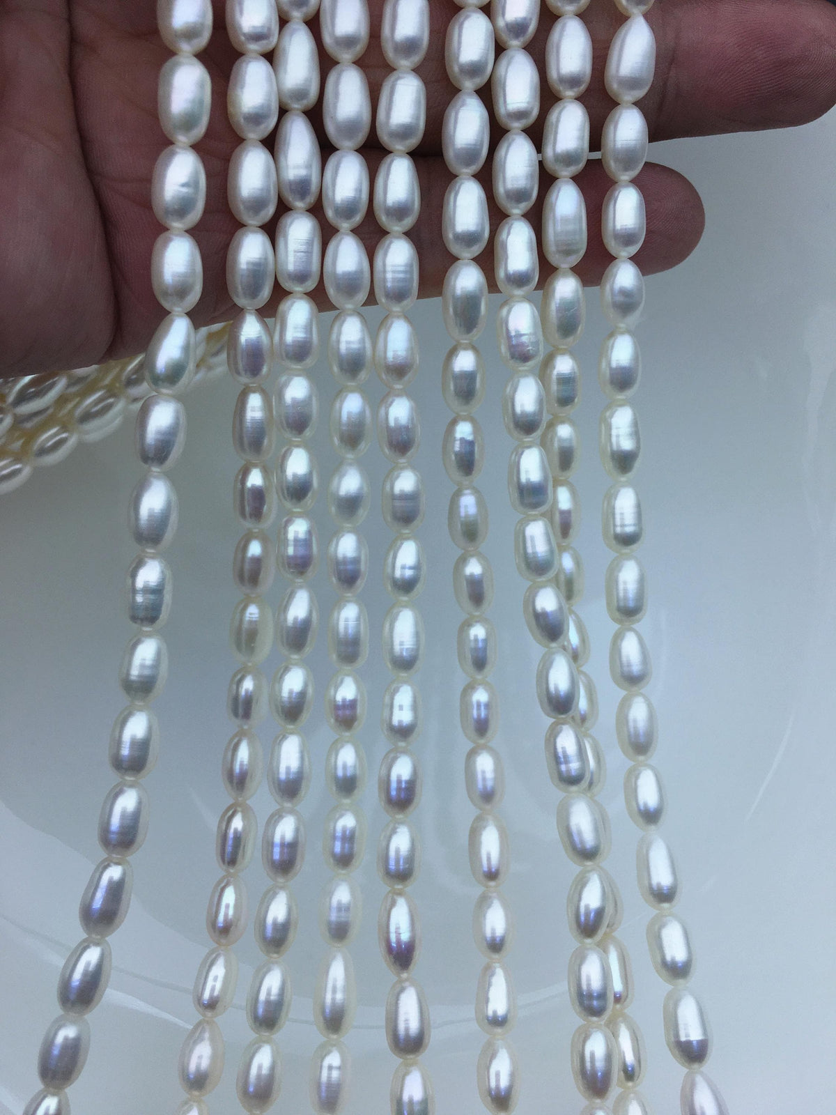 AAA 5.5-6x7-9mm white long rice freshwater pearls,Freshwater Pearl Rice Beads,LR5-3A-53