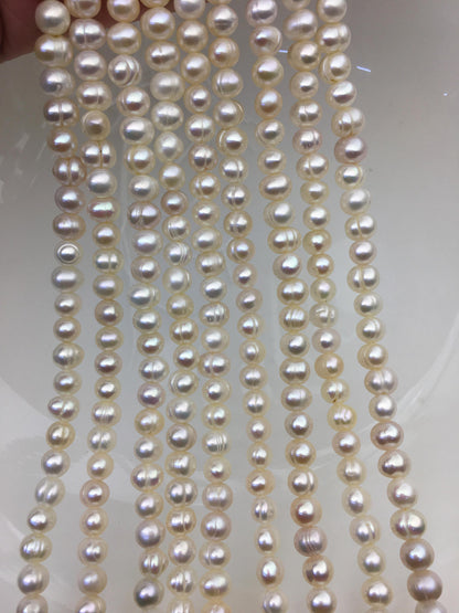 AA 5.7-6.5mm white Ring potato freshwater pearl,near round white pearl bead strand supply from China, wholesale in bulk,CR6-2A-2
