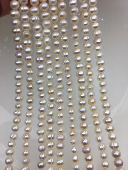 AA 5.7-6.5mm white Ring potato freshwater pearl,near round white pearl bead strand supply from China, wholesale in bulk,CR6-2A-2