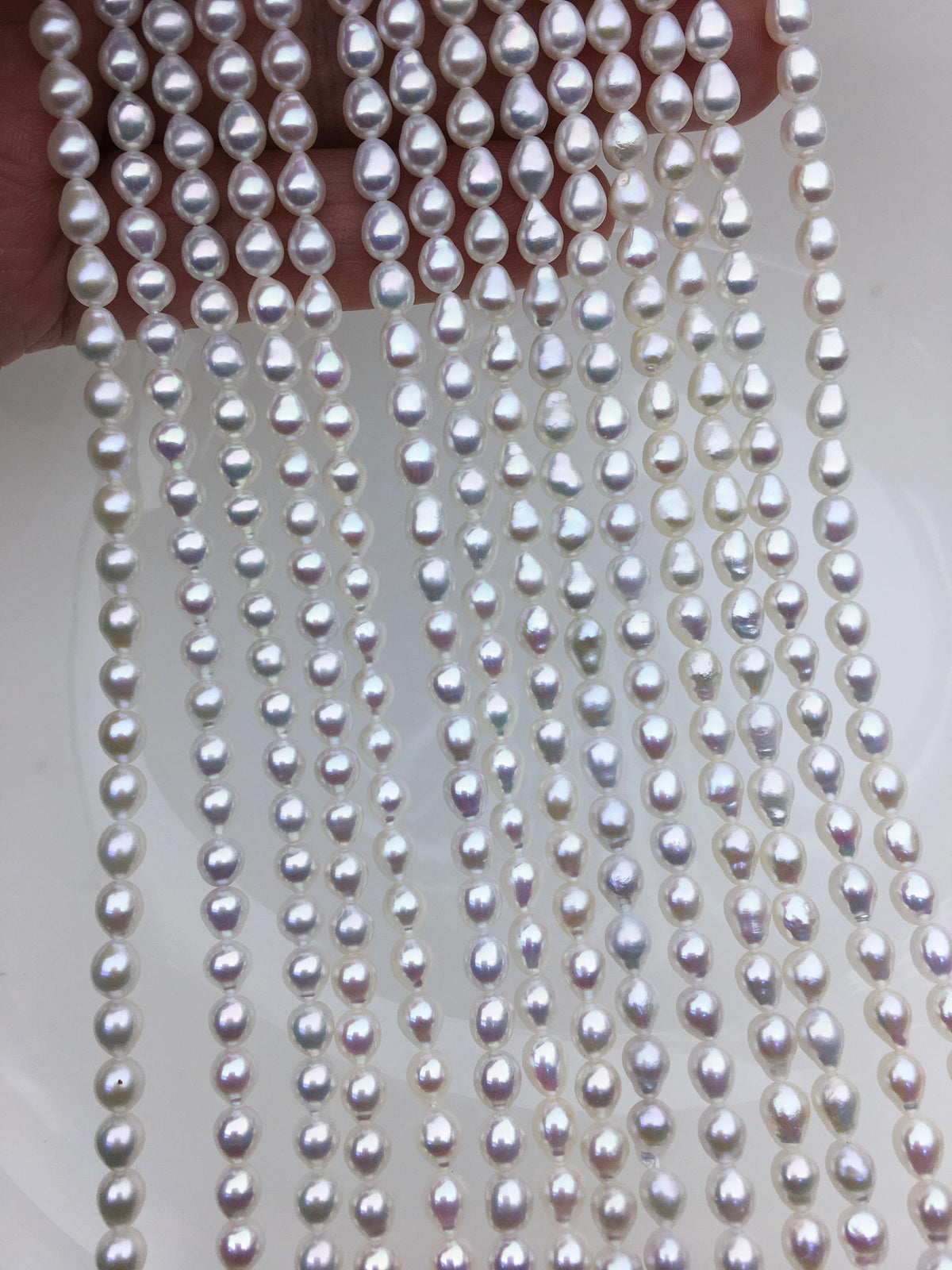 AA+ 4.7-5.1mm*5.5-7mm white baroque rice pearls,Cultured white freshwater pearls beads,teardrop pearl necklace,rice pearl wholesale,LR5-A-1