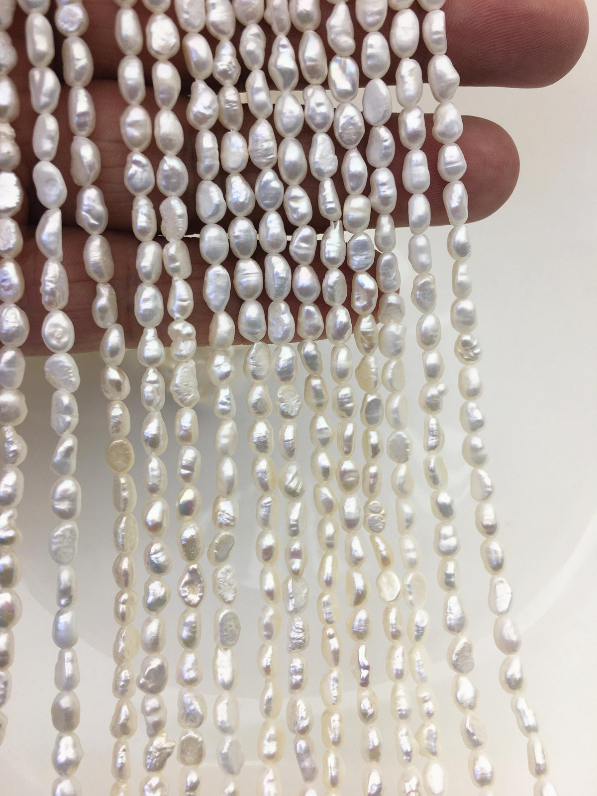3 strands AA 4-4.5mm Tiny white nugget freshwater pearls,irregular nugget freshwater pearl strand,cheap price,pearl factory china,LM4-2A-2
